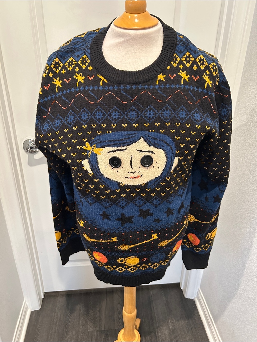Coraline Women’s Black and Blue Novelty Knit Sweater with Yellow Accent